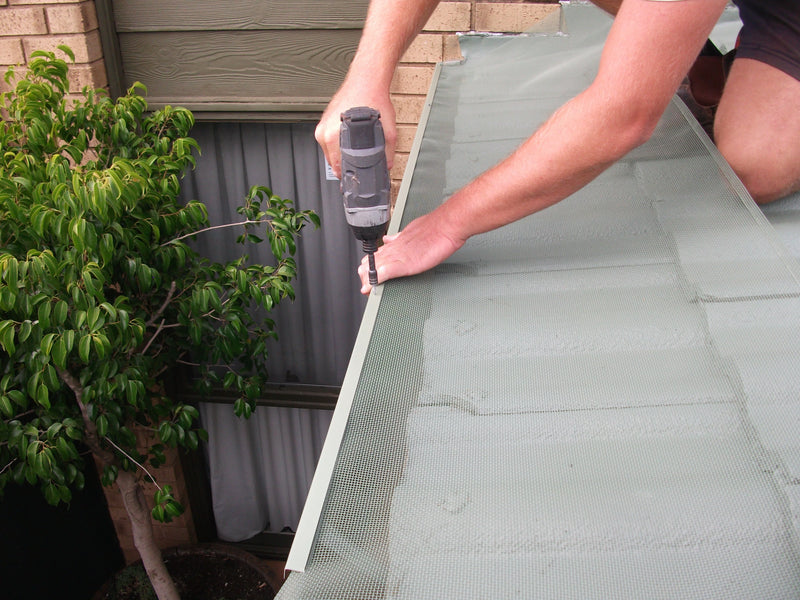 3. Attach the mesh to the gutter