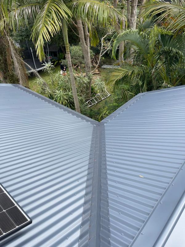 Corrugated Valley Roof with Gutter Guard Installed
