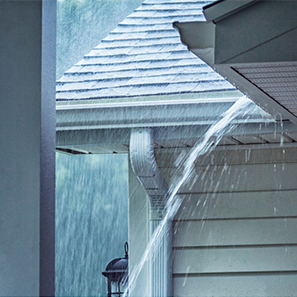 How Gutter Guards Protect Landscaping From Soil Erosion