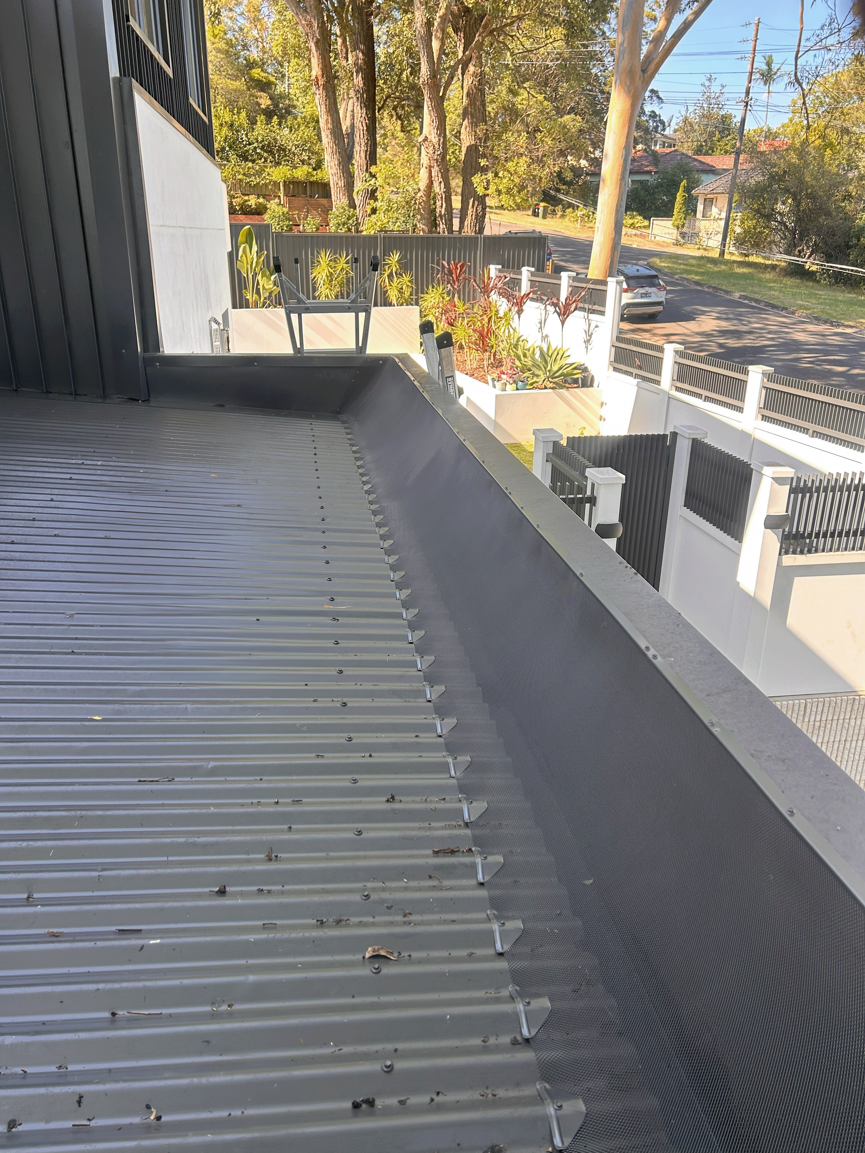 Gutter Guard installed on corrugated roof